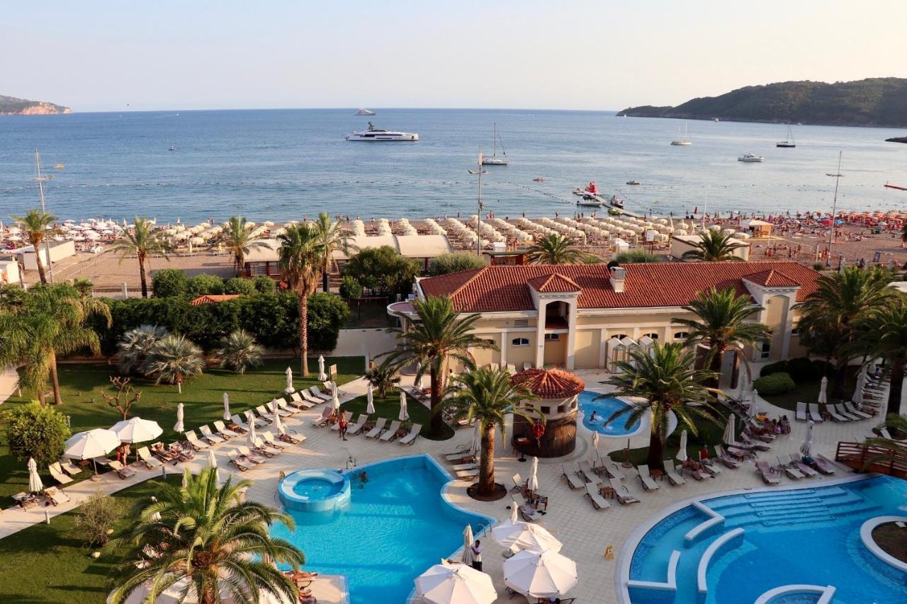 Splendid Conference & Spa Resort Budva Exterior photo A view of the beach at the Hotel Splendid